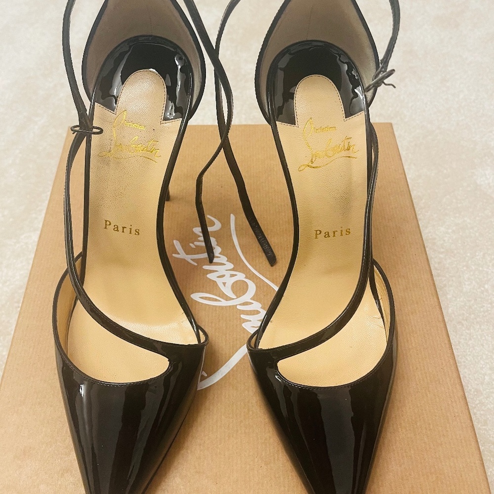 Barely worn Christian Louboutin black strappy heels pumps